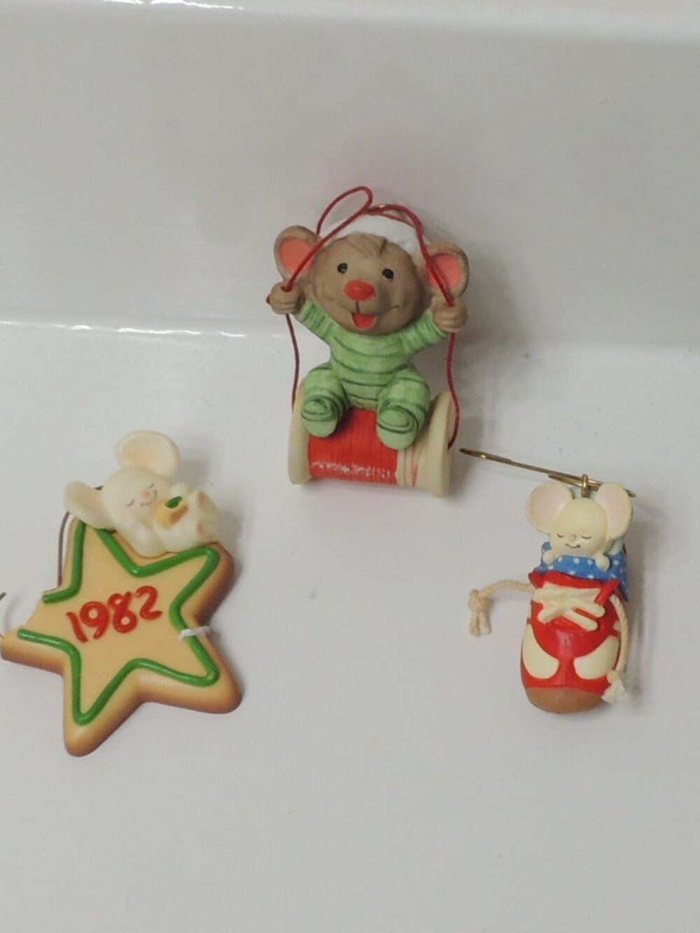 Two Hallmark mouse ornaments and one ceramic mouse ornament